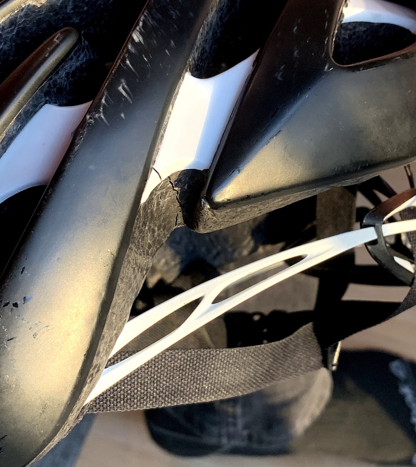 A bicycle helmet with a cracked shell
