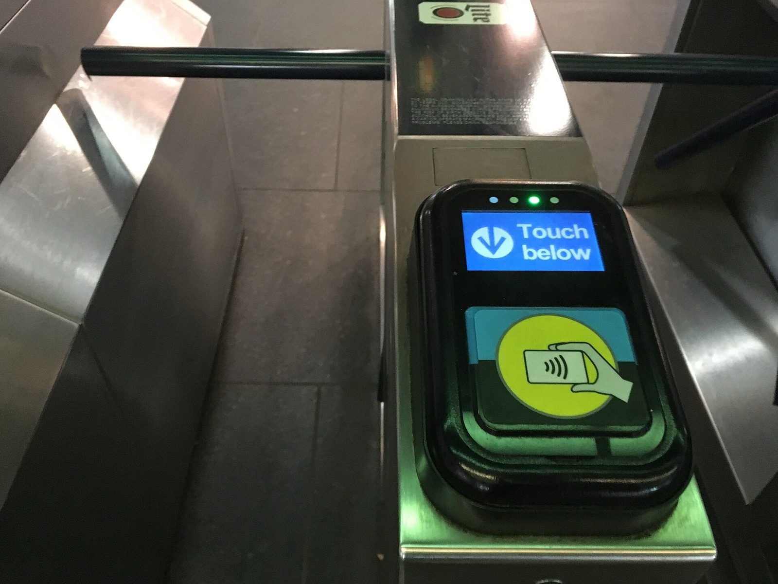 A touchless Ventra reader on a CTA turnstile