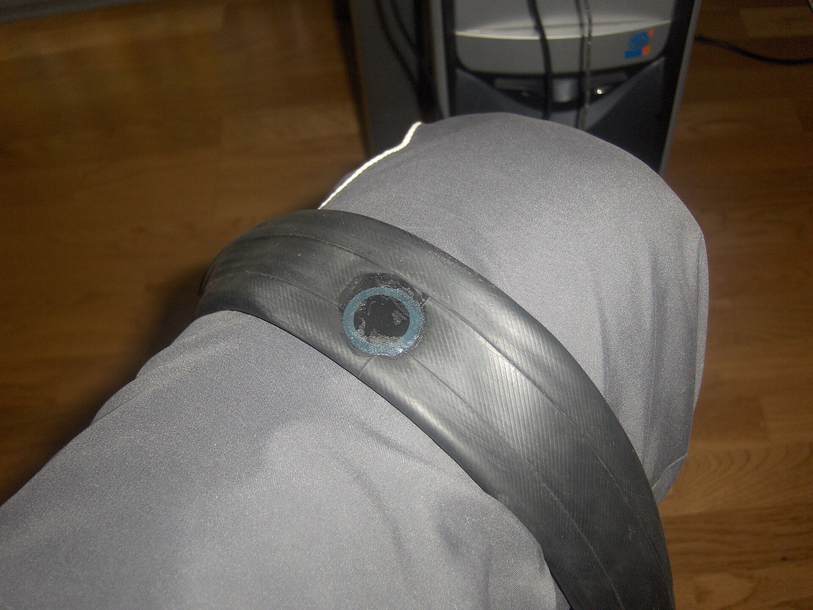 A bicycle inner tube with a round patch over a repaired puncture