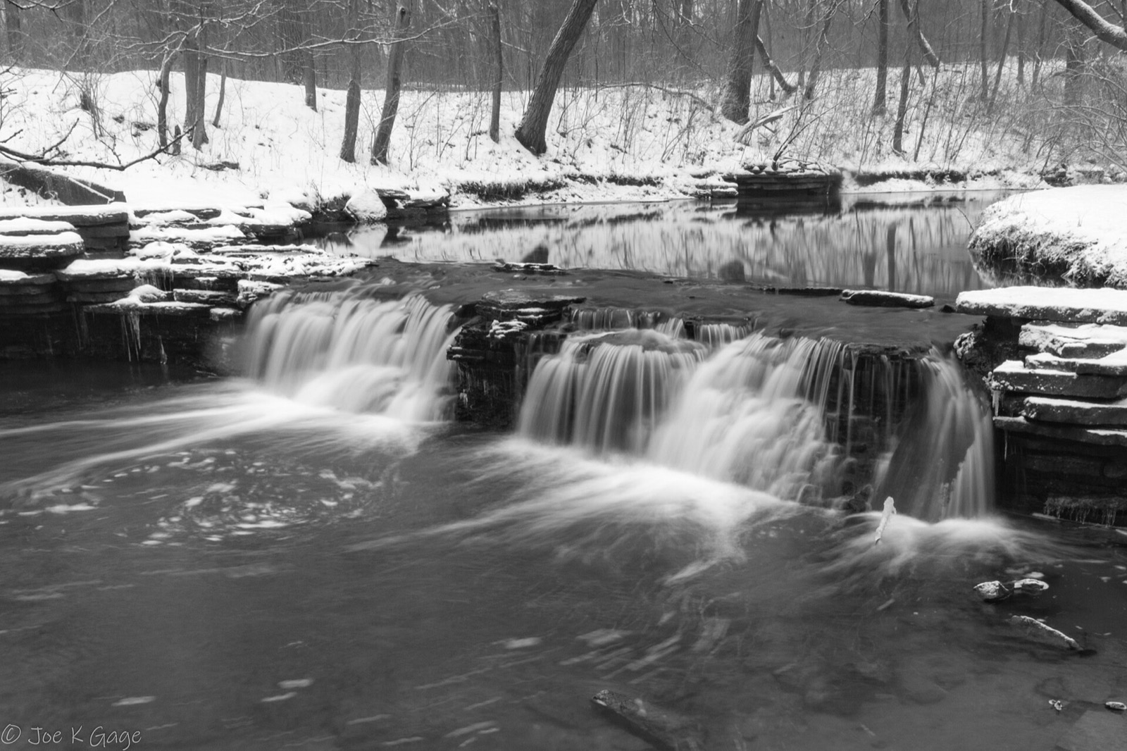 Rocky Glen Falls in snow at Waterfall Glen Forest Preserve