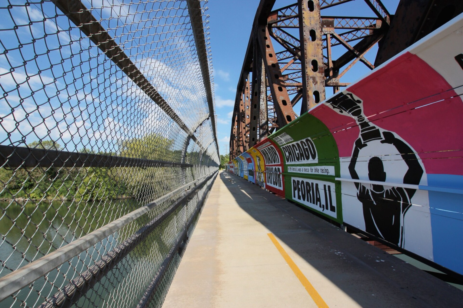 A painted mural about Major Taylor along a bridge on the Major Taylor Trail