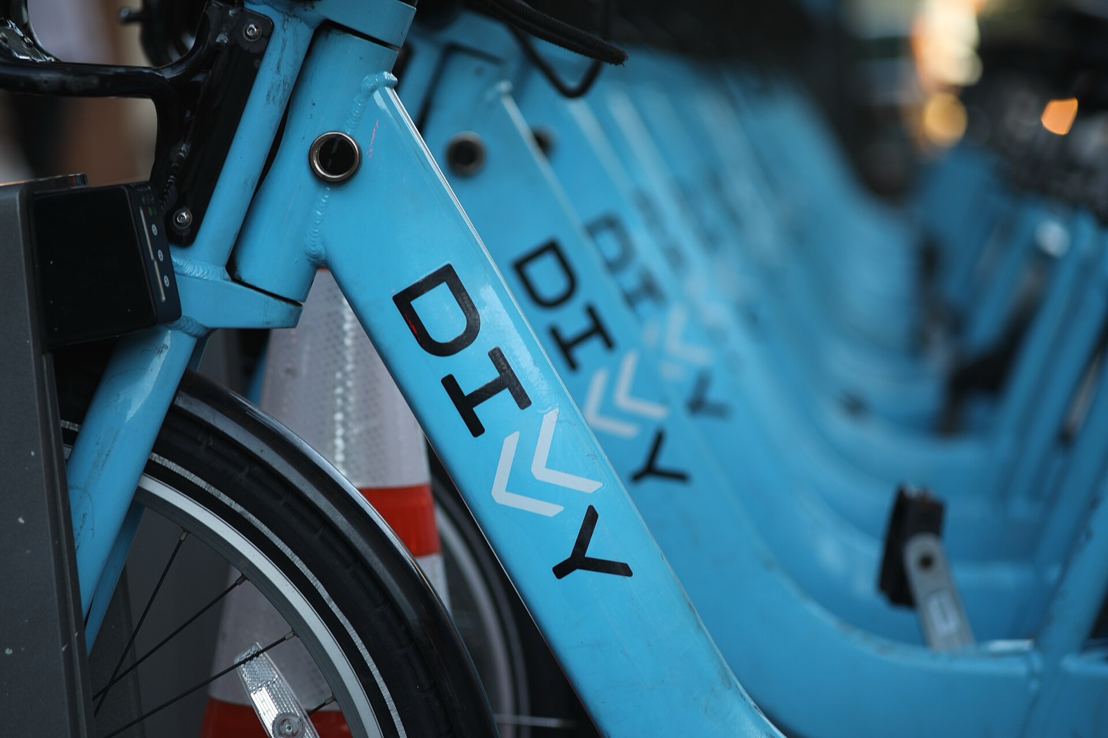 A row of Divvy bikes docked at a station in Chicago